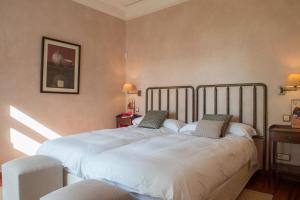 a bedroom with two beds in a room at Villa Lavanda in Benalup Casas Viejas +32 photos