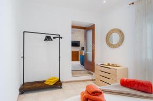 a bathroom with a walk in shower and a mirror at Casa Catalán in Carmona +50 photos