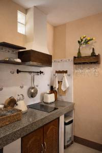 a kitchen with a sink and a counter top at Lilo House, Thaimueang Beach in Thai Muang