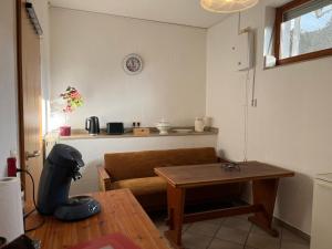 a living room with a couch and a table at Auf dem Karlsberg in Weilburg