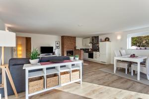 a living room with a couch and a table at Ferienwohnung Gabler in Möhnesee
