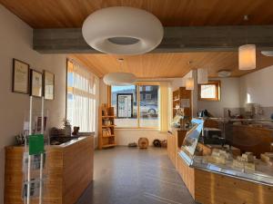 a kitchen with a counter and a window at Central Home in Krumbach in Krumbach