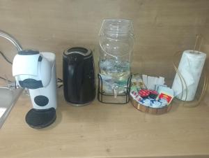 a coffee maker and a blender sitting on a counter at VIP Wellness apartma Immortality in Zgornja Velka +20 photos