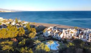 an aerial view of a resort near the ocean at Ola De Mar - Estepona in Estepona