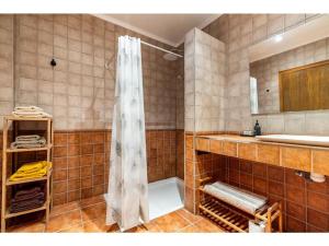a bathroom with a shower and a sink at Ca La Cuca in Alforja +27 photos