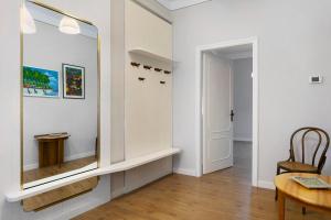a dressing room with a mirror and a table at La Casa Del Marinaio in Rapallo +24 photos