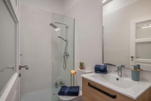a bathroom with a shower and a sink and a toilet at El rinconcito de Jess in El Golfo +50 photos