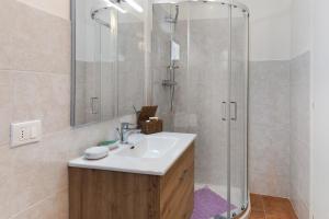 a bathroom with a sink and a shower at B&B San Giovanni in Teglio +68 photos