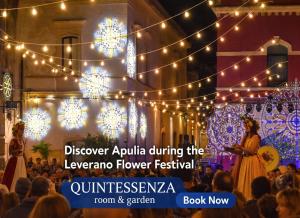 a event in a venue with lights and people at Quintessenza – Boutique Rooms in Leverano