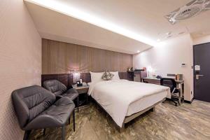 Postel nebo postele na pokoji v ubytování Hotel I Journey