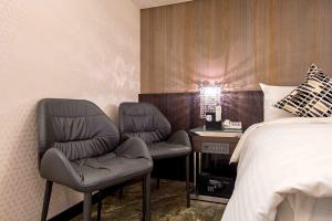 Postel nebo postele na pokoji v ubytování Hotel I Journey