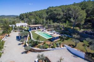 an aerial view of a house with a swimming pool at Can Ribes Ibiza in Illes Balears