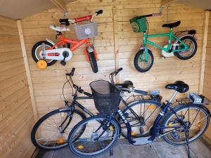 a group of bikes parked in a garage at Ferienhaus Concordia in Friedrichsaue