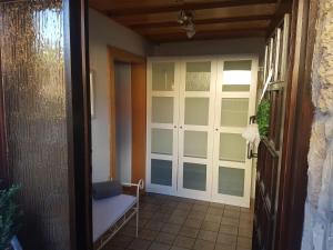 an entrance to a room with a sliding glass door at Ferienwohnung Reblaus in Markt Einersheim