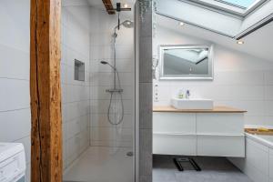 a bathroom with a shower and a sink at Ferienwohnung Doris in Viöl +53 photos