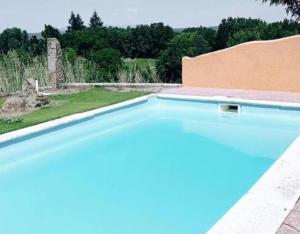 a view of a swimming pool on a house at Mansió De La Plata in Peñacaballera
