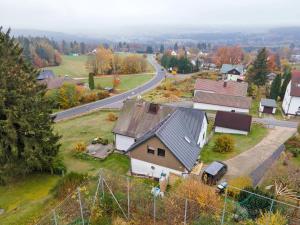 an aerial view of a house and a road at Naturoase Fichtelberg in Fichtelberg
