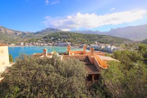 a house on a hill with a view of a lake at Montemar 34 in Port de Soller