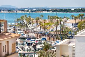 a view of a marina with boats in the water at Casa Rewa in Port d'Alcudia