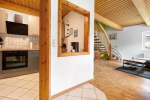 a kitchen and living room in a house at Inge Huus in Hude