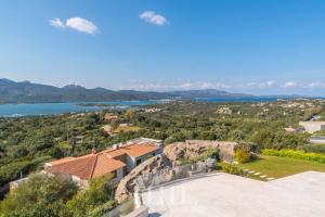an aerial view of a house with a view of the water at Elite Collection Villa Noemi in Porto Rotondo