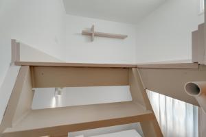 a drawer in a kitchen with a cross on it at Serenity in Arona