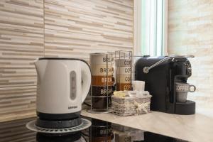 a coffee maker sitting on top of a counter at Zelda Casa Vacanza in Giovinazzo