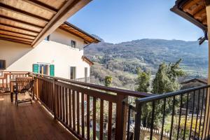 a balcony with a view of the mountains at Residence Lena App 3 with Balcony in Tenno