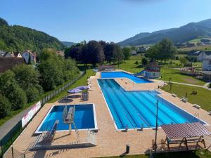 an overhead view of a large swimming pool at Fewo Blumenweg in Elzach