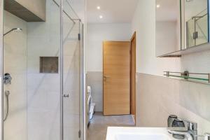 a bathroom with a shower and a sink at Apartment Villa Stumm in Stumm +28 photos