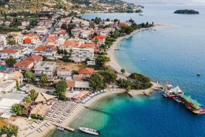 an aerial view of a beach with boats in the water at Mella Roa - Teal studio in Nydri