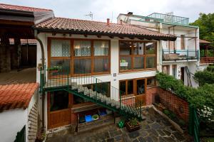 an aerial view of a house with a balcony at Casa Bruna - 100m dal Lago Maggiore in  Monvalle 