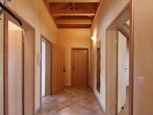 a hallway of a house with a hallway leading to a door at Ferienwohnung Graf in Vogtsburg