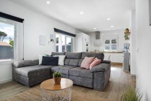 a living room with a couch and a table at Villa Edén in La Muela