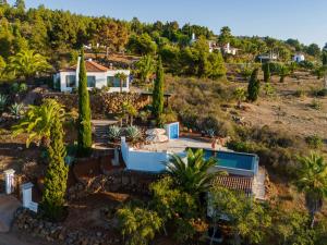 an aerial view of a house with palm trees at Villa Miramar in Puntagorda