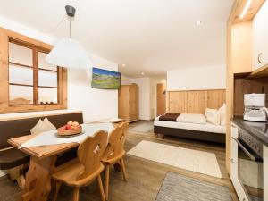 Postel nebo postele na pokoji v ubytování "Innsbruck Moments" Kasperhof Appartements