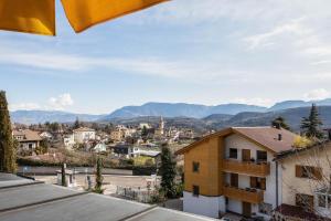 a view of a city from a building at Stompferhof Mansarde in Caldaro