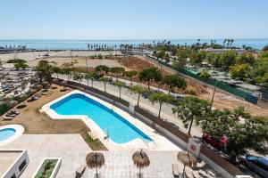 an overhead view of a swimming pool at a resort at Adhara 053 in Torre del Mar