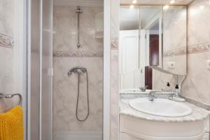 a bathroom with a sink and a shower at Torre del Mar Studio in Torre del Mar +17 photos