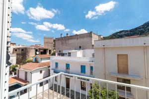 a view from a balcony of buildings at Appartamento Blu in Dorgali