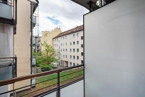 a view from the balcony of a building at Aldars Urban Grand Suite No.15 in Munich
