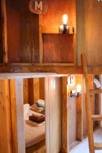 a room with a bunk bed in a cabin at GuestHouse Azito in Hakone