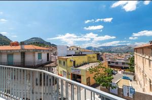 a view of a city from a balcony at Appartamento Castula in Dorgali