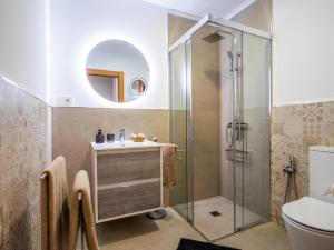 a bathroom with a shower and a sink at 'Mi Esperanza' in Almuñécar +24 photos
