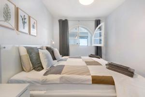 a bedroom with a large bed in a room at Bungalow Seaview in San Bartolomé
