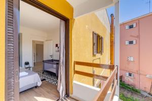 a room with a view of a bedroom at Eirini's Apartment in Kanoni
