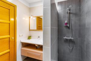 a bathroom with a sink and a shower at Villa Teide in La Orotava +33 photos