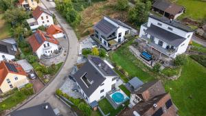 an overhead view of a house in a suburb at Ferienwohnung Talblick in Kappelrodeck