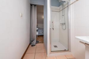a bathroom with a shower and a walk in shower at Les Hortensias - Gîtes in La Croix-Helléan +72 photos