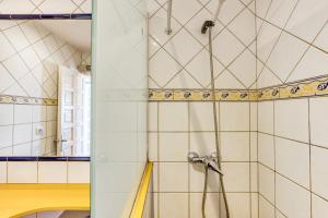 a shower in a bathroom with at Mimosa in L'Escala +19 photos